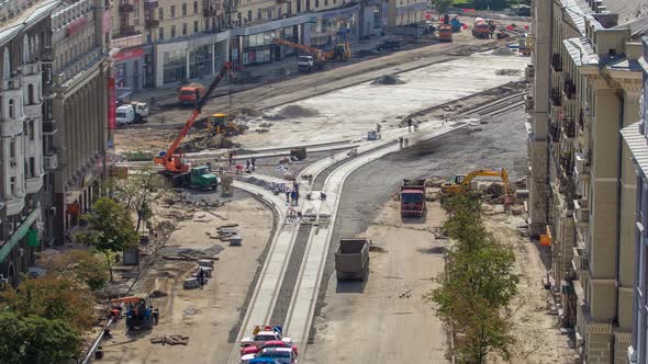 Concrete Works for Road Construction with Many Workers and Mixer Timelapse alt
