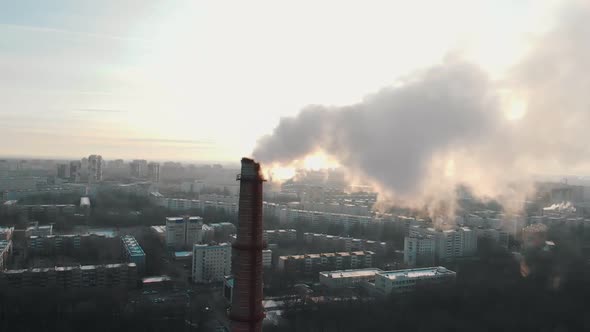 Air Pollution Problem - a Smoke From Industrial Pipe Pollutes the Air in the City alt