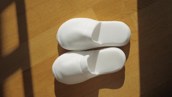 White slippers in the sun alt