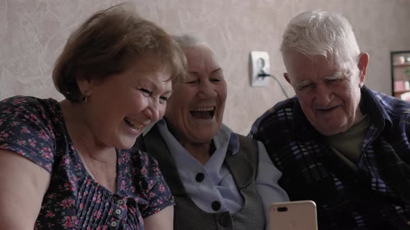 A Senior Couple Talking On A Video Call