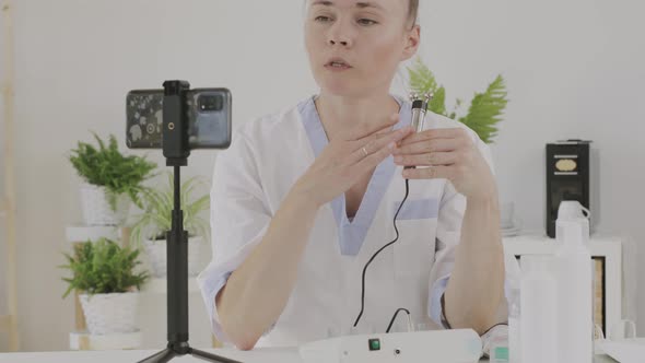 Female Cosmetologist is Giving Online Consultation alt