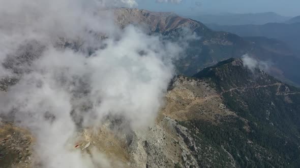Clouds High in the Mountains Aerial View alt