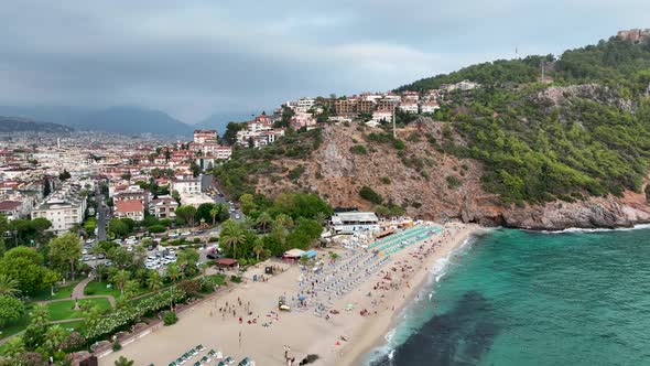 Cloudy summer beach aerial view 4 K alt