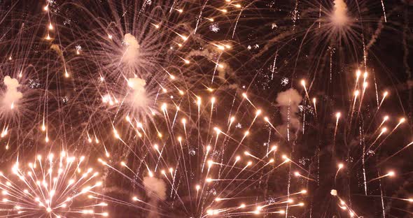 Fireworks show against the background of the night sky alt