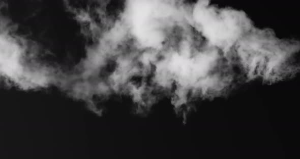 White Smoke Floating On A Black Background