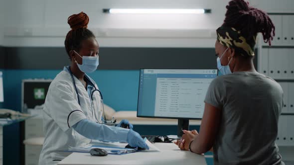 Specialist Giving Bottle of Pills and Paper with Prescription alt