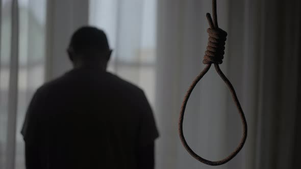 Depressed Man Contemplating Suicide alt