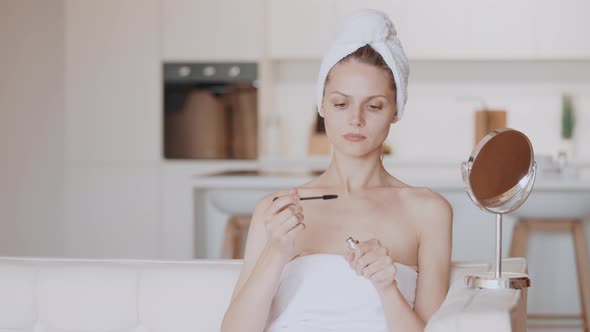 Woman Make Up Put Cosmetics on Face alt