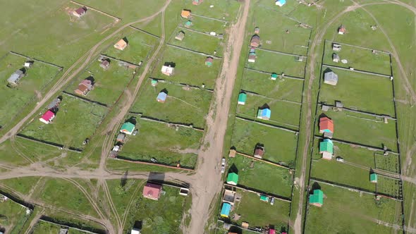 Aerial View of Little Town Landscape of Colorful Houses in Mongolia alt