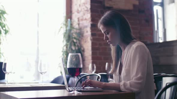 Young girl with laptop  alt