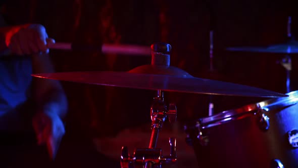 Drummer playing on drum set 4k alt