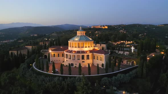 Aerial Footage Of A Hilltop Church During Blue Hour
