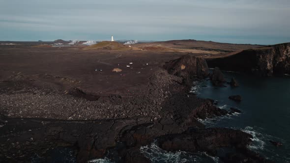 Drone Over Sea Towards Coastline And Landscape Of KeflavK alt