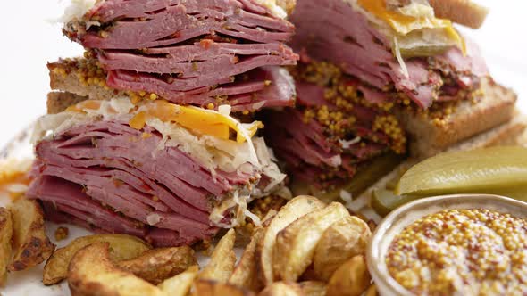 Super Deluxe Tasty Grilled Reuben Sandwiches with Pastrami Meat Cheddar Cheese alt