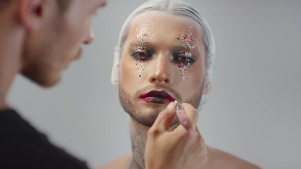 Man with Dramatic Make-Up Posing alt