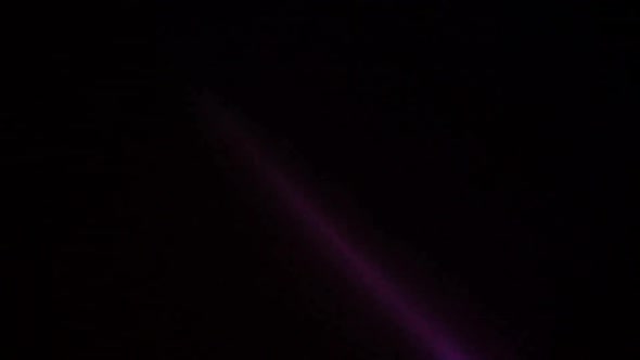 Purple light leak overlays footage .Black background, Stock Footage