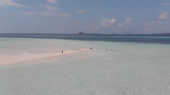 Young Woman On A Desert Island, Indonesia