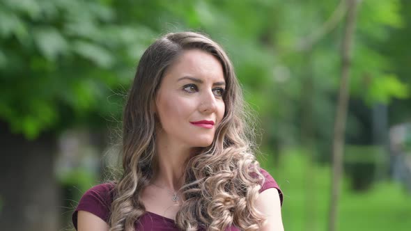 Portrait of a woman smiling alt