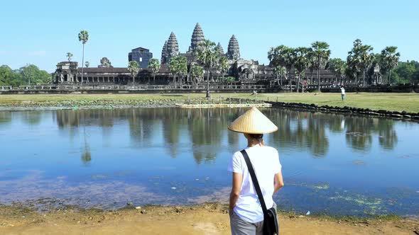 One tourist visiting Angkor ruins travel destination Cambodia alt