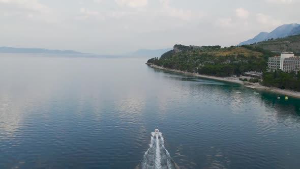 CROATIA July 2021 Beautiful Aerial Over the Tucepi Coast Motorboat Sails at Makarska Riviera in the