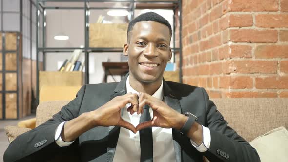Handmade Heart Sign by Black Businessman alt