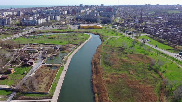 River within the city. Panorama of the city of Mariupol Ukraine.