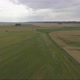 Aerial Video Of Green And Yellow Fields In The Summer - VideoHive Item for Sale