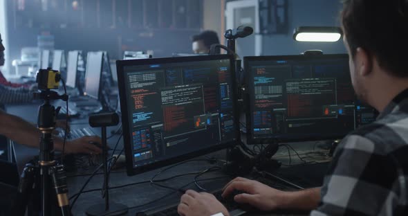 Programmer Working in Common Office alt