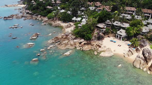 Small Houses on Tropical Island. Tiny Cozy Bungalows Located on Shore of Koh Samui Island alt
