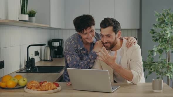 Lgbt Gays Feeling Happy Couple Using the Laptop for Video Call to Show the Proposal Ring to Their alt