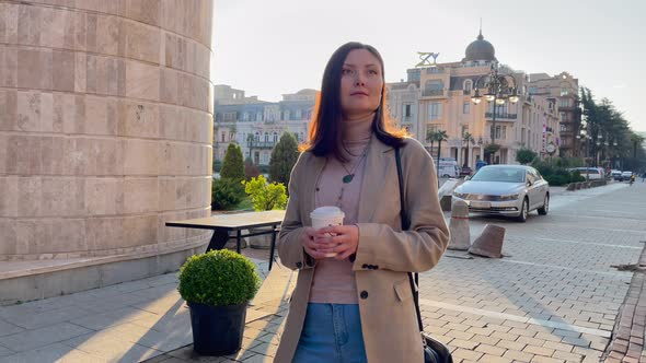 Happy Female With Coffee at the Morning