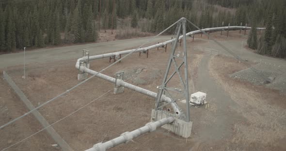 Helicopter aerial shot of dock and ocean, day alt