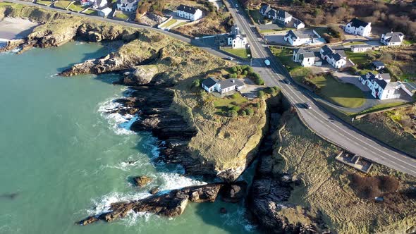 Aerial Shot of the Sunny Rocky Coast of Portnablagh Co alt