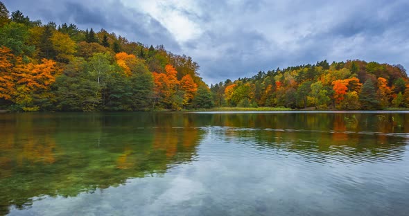 Zoom Out  Timelapse of the Autumn Landscape with Lake