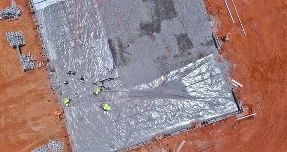 A Barrier Plastic Barrier is Installed Before Concrete is Poured Into the Foundation of a Structure alt