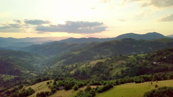 Aerial View of the Endless Lush Pastures of the Carpathian Expanses and Agricultural Land alt
