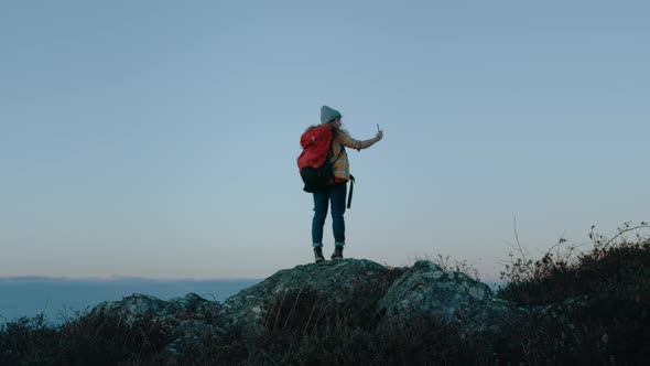 Woman Hiker on Adventure Trip in Film Sunset alt