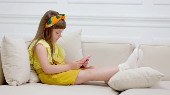 the Girl Looks at the Phone alt