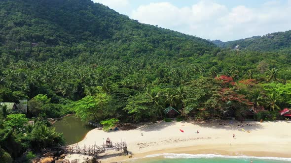 Aerial top view scenery of tropical bay beach journey by blue green lagoon with white sandy backgrou alt
