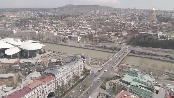 Tbilisi, Georgia - April 5 2021: Aerial view of Baratashvili Bridge and Public Registry. alt