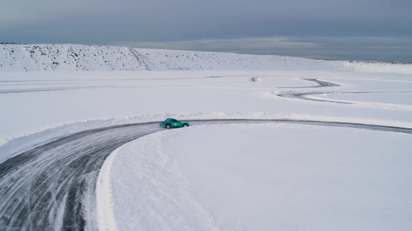 Aerial View of a Racing Car at an Ice Rally alt