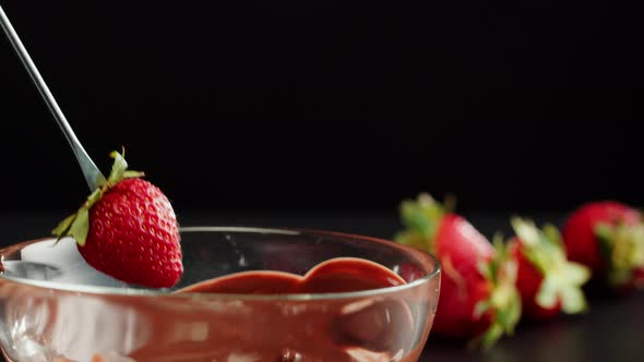 Strawberry in Melted Chocolate Closeup Melting Chocolate Bar for Fondue alt