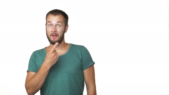 Copy Space Portrait of Adult Joyful Man with Beard Pointing Index Finger on Great Thing Showing alt