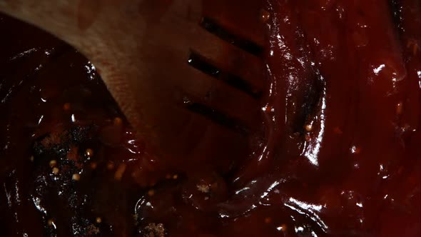 BBQ sauce being cooked from scratch in ultra slow motion alt