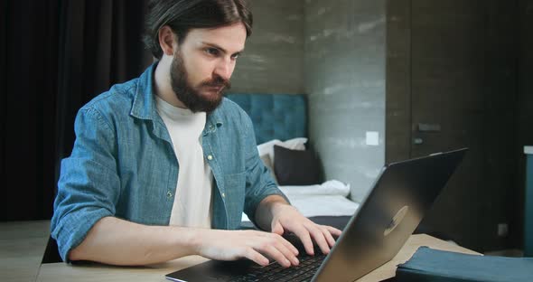 Student Working on Laptop