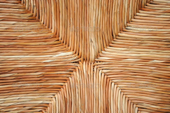 wicker chair, straw background