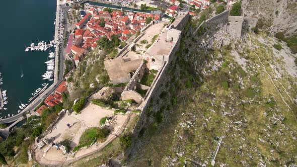 Aerial Shot of the Fortress St John San Giovanni Over the Old Town of Kotor the Famous Tourist Spot alt