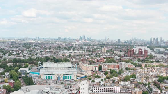slider drone shot around stamford bridge chelsea stadium London skyline alt