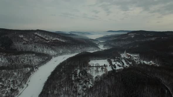 Aerial view of snowy winter forest nature  alt