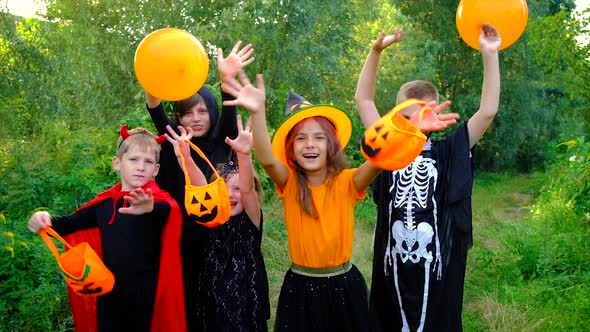 Children are Celebrating Halloween in Costumes alt